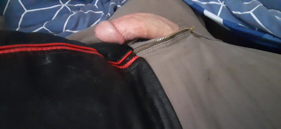 Rusty Sunnybrook: Edging in Red and Black Leather Jacket