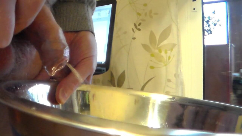Sex hub male: Closeup of John peeing into a steel bowl