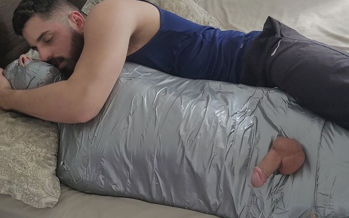 Rope hunter: Bearded dom using mummified boy as a toy