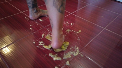 Fetish videos by Alex: A Banana Is Trampled by a Blonde Tattooed MILF