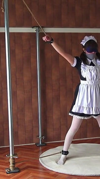 A Restrained Maid Writhing in Pleasure From a Remote-controlled Vibrator