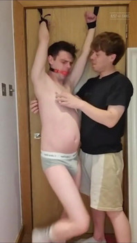 Tied to the Door and Tickled Until I Wet Myself