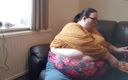 SSBBW Lady Brads: SSBBW huge belly whilst eating on sofa