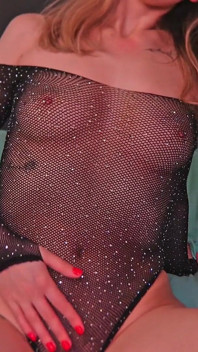 A Beauty with Cute Tits and in Beautiful Lingerie Watches Porn and Caresses Herself