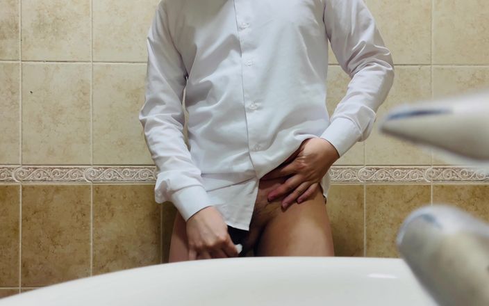 Asian Fantasy: A Hot Bathroom Cumshot Momentum of Asian Guy After Pissing