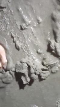 Beach Feet Covered in Wet Sand