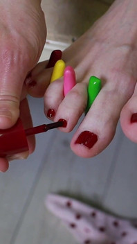 Sweet Toe Tease - Colorful Candy Between Her Toes