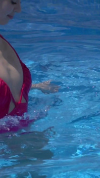 Lesbian Girls Are Having Fun in a Pool with an Inflatable Shark