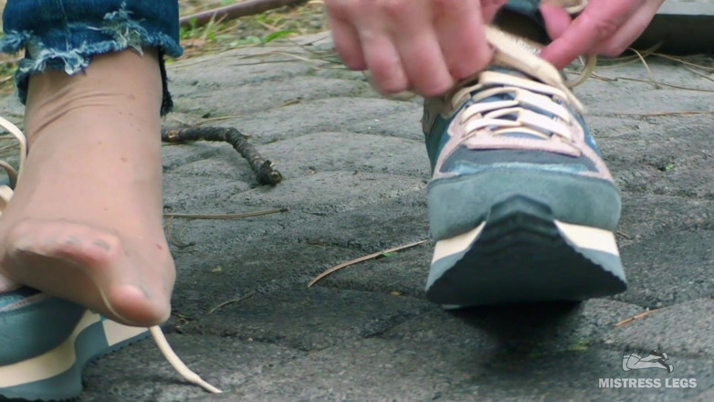 Mistress Legs: Cute soles in nylon socks outdoor on rainy day