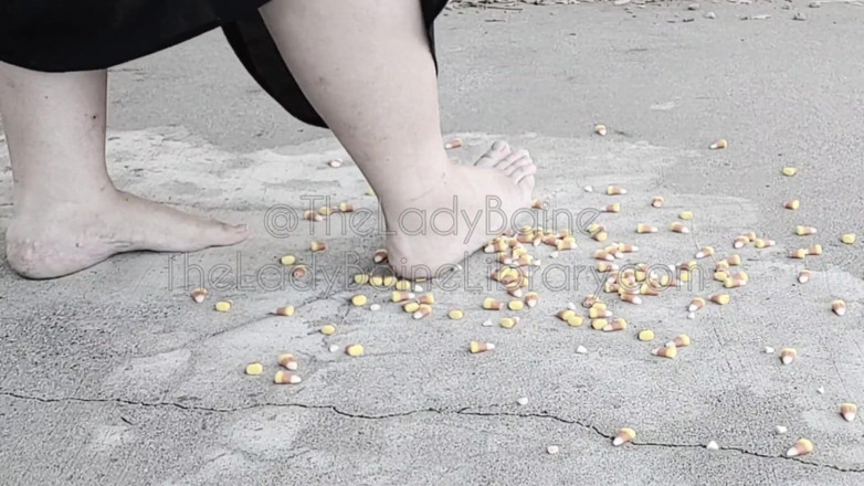 TheLadyBaine: SSBBW barefoot demoness candy corn crushing