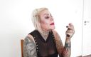 Fetish Videos By Alex: Tattooed blonde milf lipsticks her lips