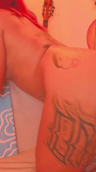 A Latina with a Tattooed Body Is Shaking Her Butt for You