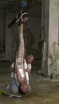 Hanging Like a Piece of Meat