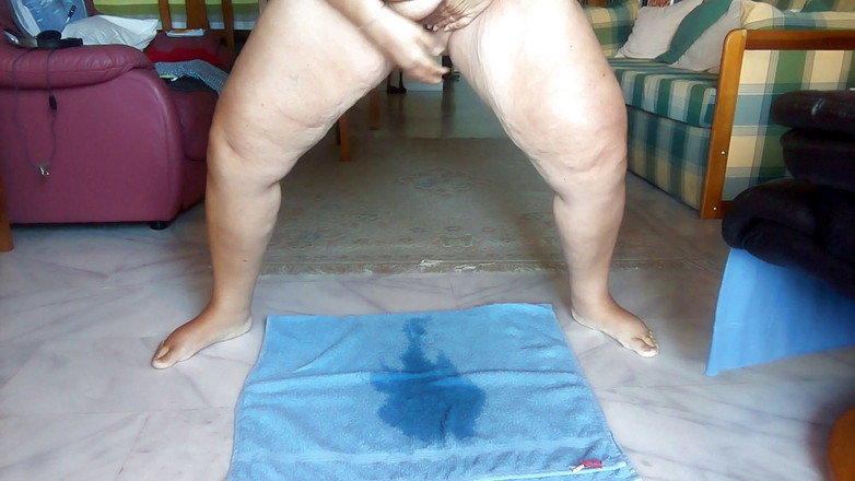 Sex hub couple: Jen is standing up and is peeing on a towel...