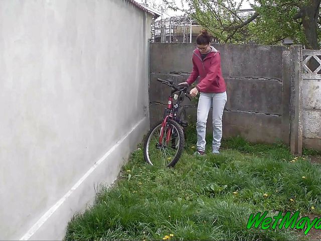 Pissing in the backyard on a cold day, and leaving on her bike (Wet Maya)