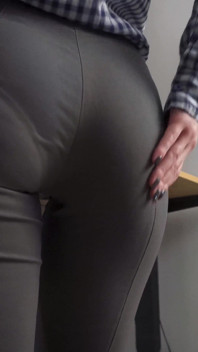 MILF Secretary in Tight Trousers Teases Her Visible Panty Line
