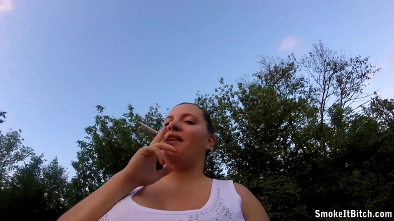 Smoke it bitch: Brunette chick Rose smokes her cigarette outdoor in POV