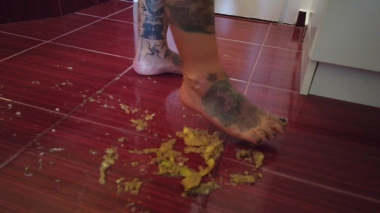 Fetish videos by Alex: A Banana Is Trampled by a Blonde Tattooed MILF
