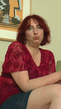Busty redhead milf lovingly shoves sex toys into her pussy