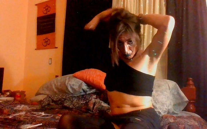 ZooM StoodioZ: Sexy tranny smoking 120s and showing off