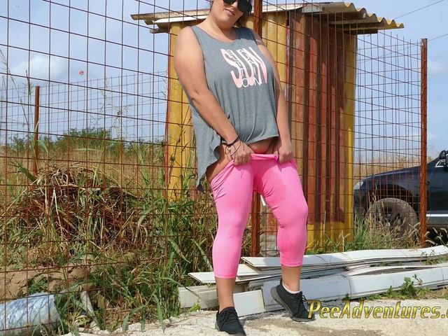 Fat Brunette with Sunglasses Pee in Her Tights on a Dirt Road and Then She Pee on the Concrete in Front of a House (Pee Adventures)