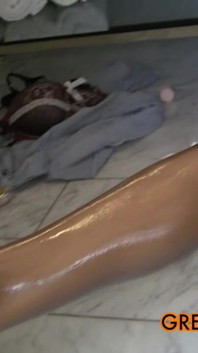 Skinny ebony teen Inanna oils up her naked body and fucks her tight asshole