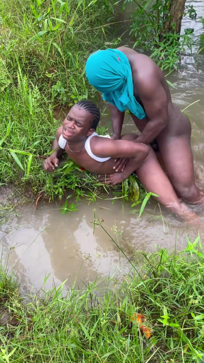 Big Hoss: Sex Inside a Swampy River Rounded by Wild Bushes