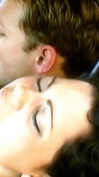 A horny young couple has sex in a car in the middle of nature