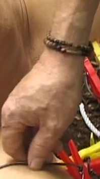 Hooded Mature Man Endures Clamps and Heavy Chains