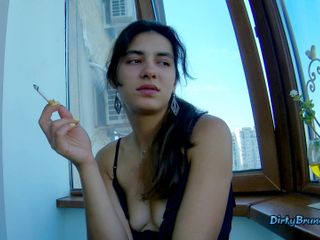 Dirty Brunette: Fingering her pussy on the balcony while smoking