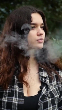 Sweet and Busty Russian Babe Smoking Cigarette in Nature