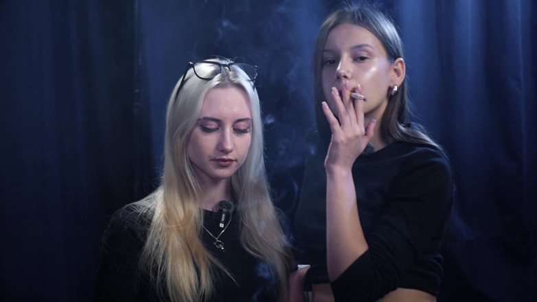 Russian Smokers: Two Women Smoking Together in a Dark Studio with Soft...