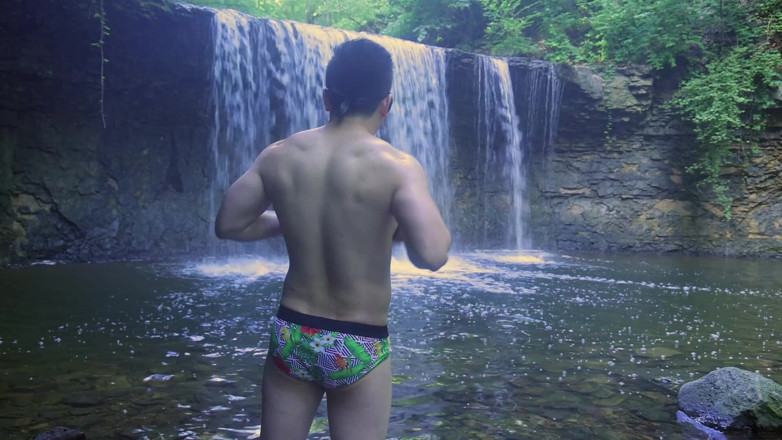 Barenakedmuscles: Muscular Asian Hunk Flexes in Speedo by Waterfall - Tight Ass &amp;...