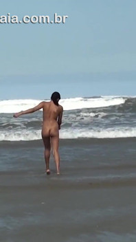 Horny married woman in public nudity records video having fun on the beach