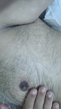 Indian Daddy Lying on the Bed Teasing and Posing for You