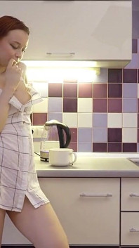 Naughty Redhead Loves Wet Play on Kitchen