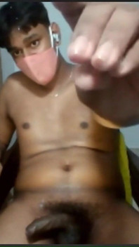 Brown Guy Jerks His Black Cock and Shoots a Load of Cum