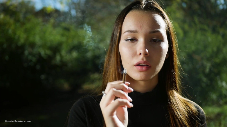 Russian Smokers: Sweet Sensual Russian Girl Smoking Cigarette Outside