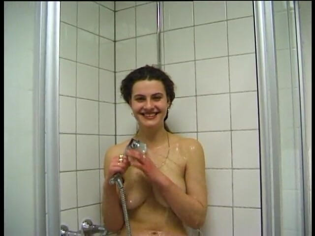 Lucky Cooch: Busty brunette is blowing hard dong in the bathroom