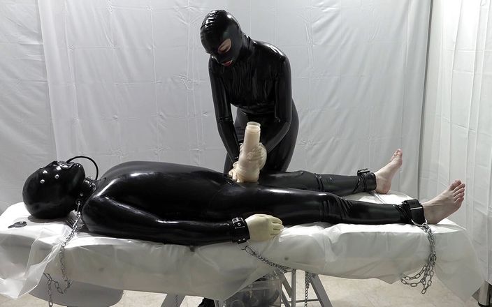 Latex Danielle: Mrs. Dominatrix and her experiments on a slave.