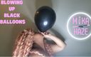 Mika Haze: Blowing up black balloons