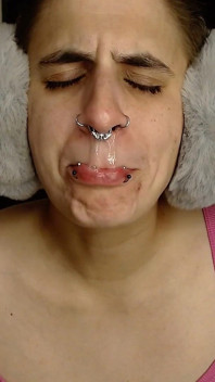 Sick Girl Makes a Snotty Mess All Over Her Face