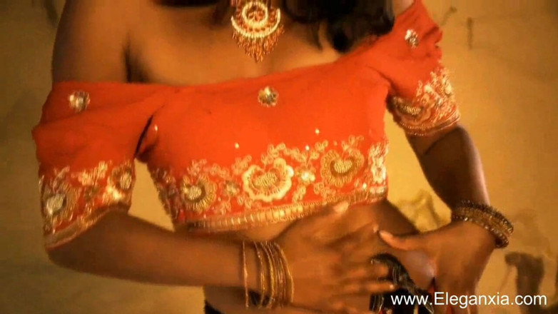 Eleganxia: Beautiful Indian babe dancing outdoor