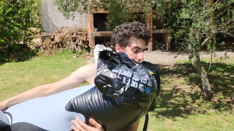 Floatie Boy: Beautiful Man Inflates His Inflatable Whale Near Pool Outside
