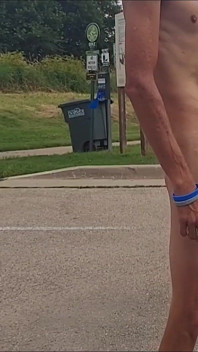 Naked and Pissing in Parking Lot
