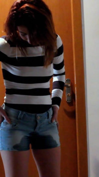 Skinny Redhead Pee in Her Short Jeans
