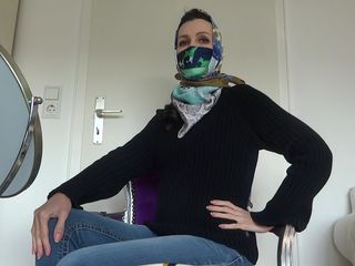 Lady Victoria Valente: Silk cloth mask and headscarf with turtleneck sweater and jeans