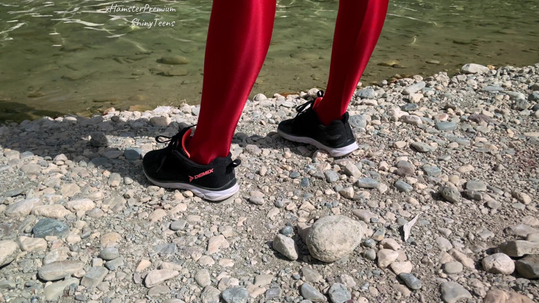Shiny teens: Shiny red lycra tights and microdress on mountain river