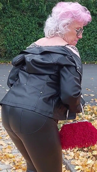 Naughty Granny Tongue Out Flashing Big Tits in Public