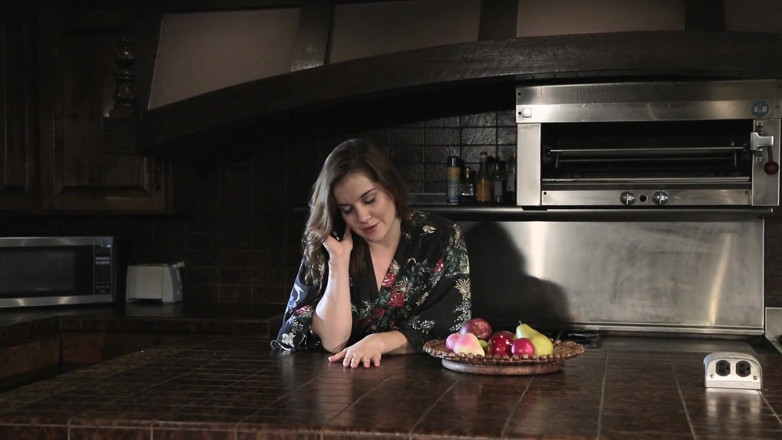 Adam & Eve: Fabulous brunette rubs her pussy in the kitchen